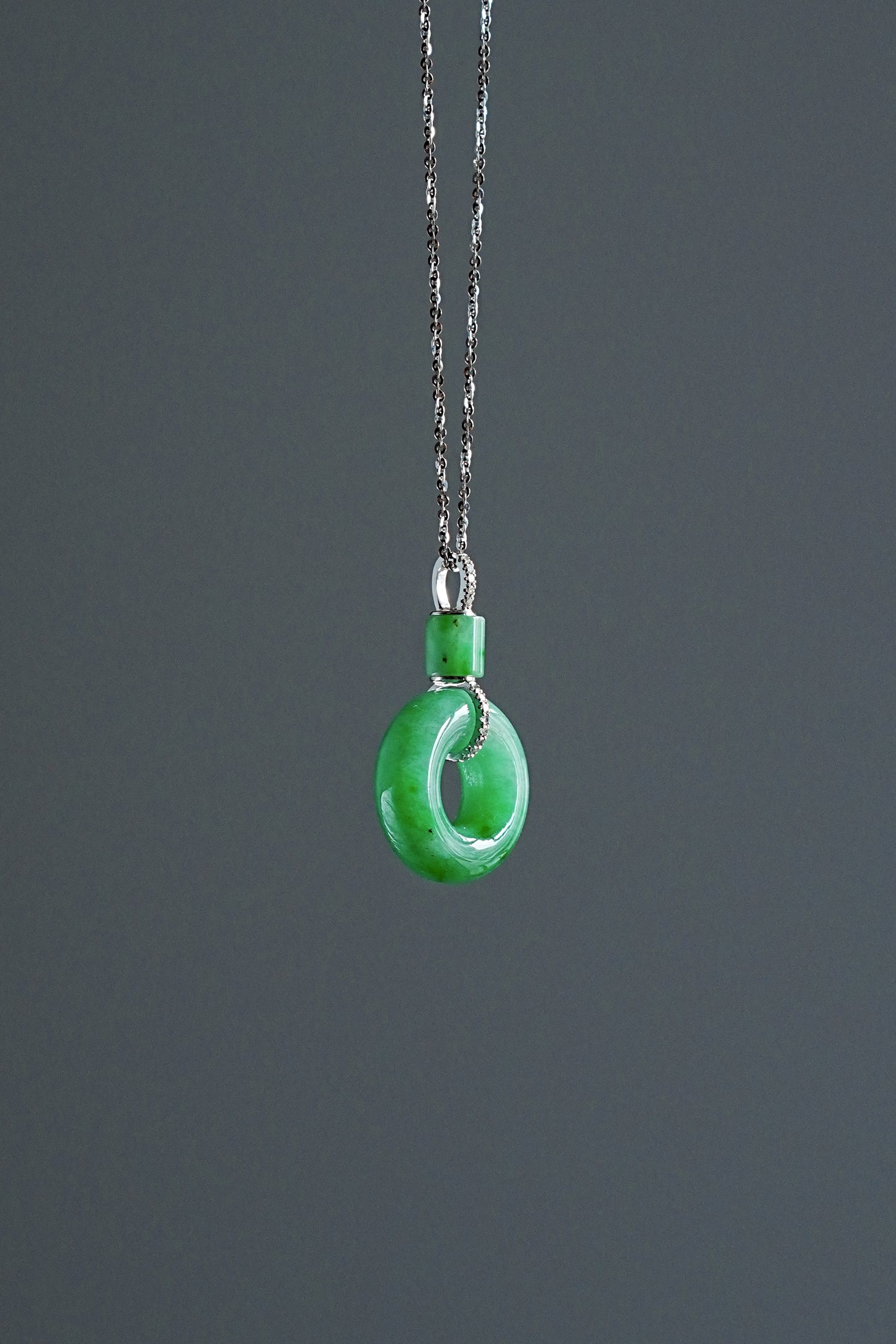 #0440 "Ping An Kou" Vivid Green Jadeite Jade Donut 18K White Gold Pendant