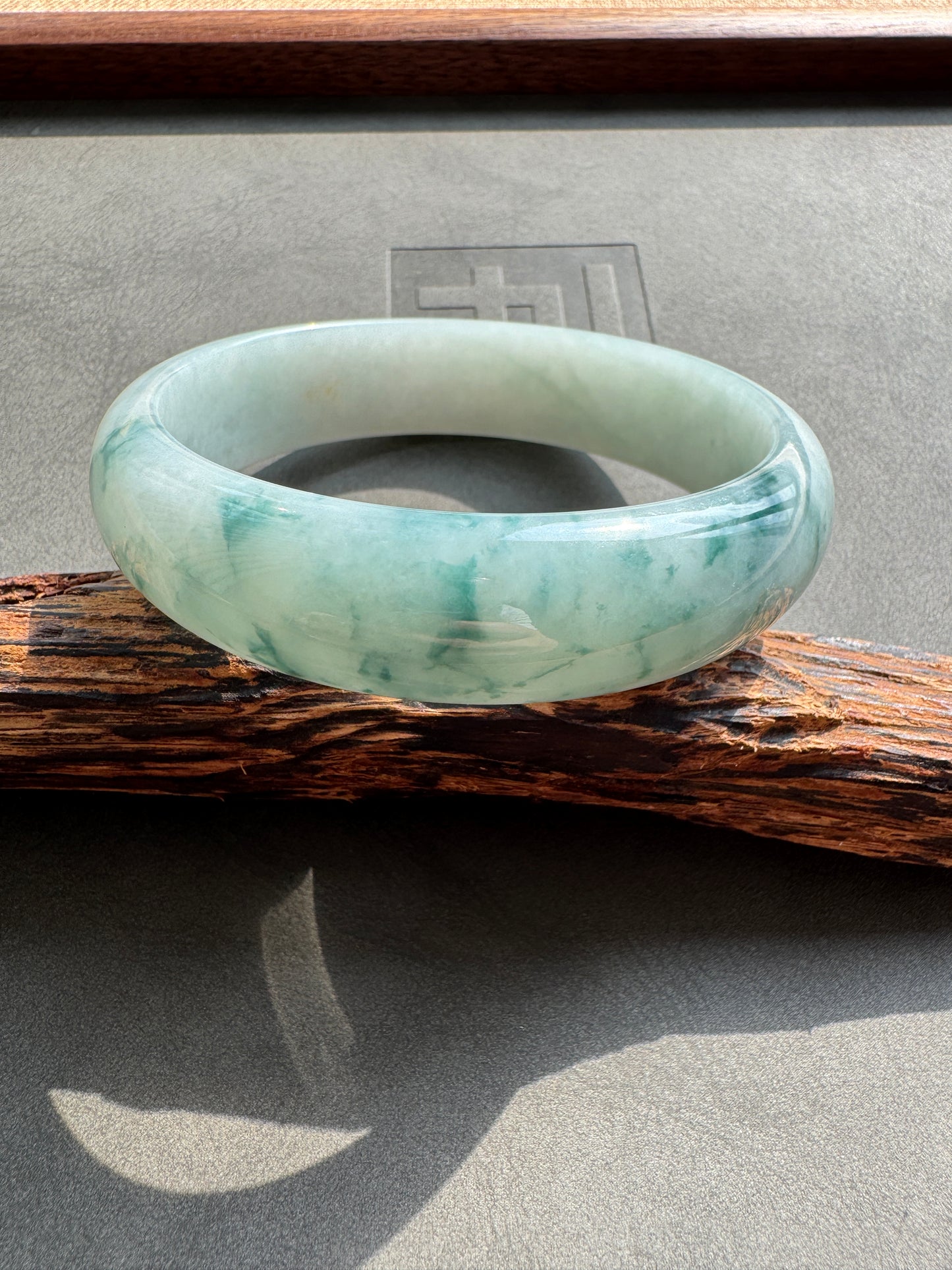 #0399 Icy Bluish Green Flower Jade Bangle Size 60.6