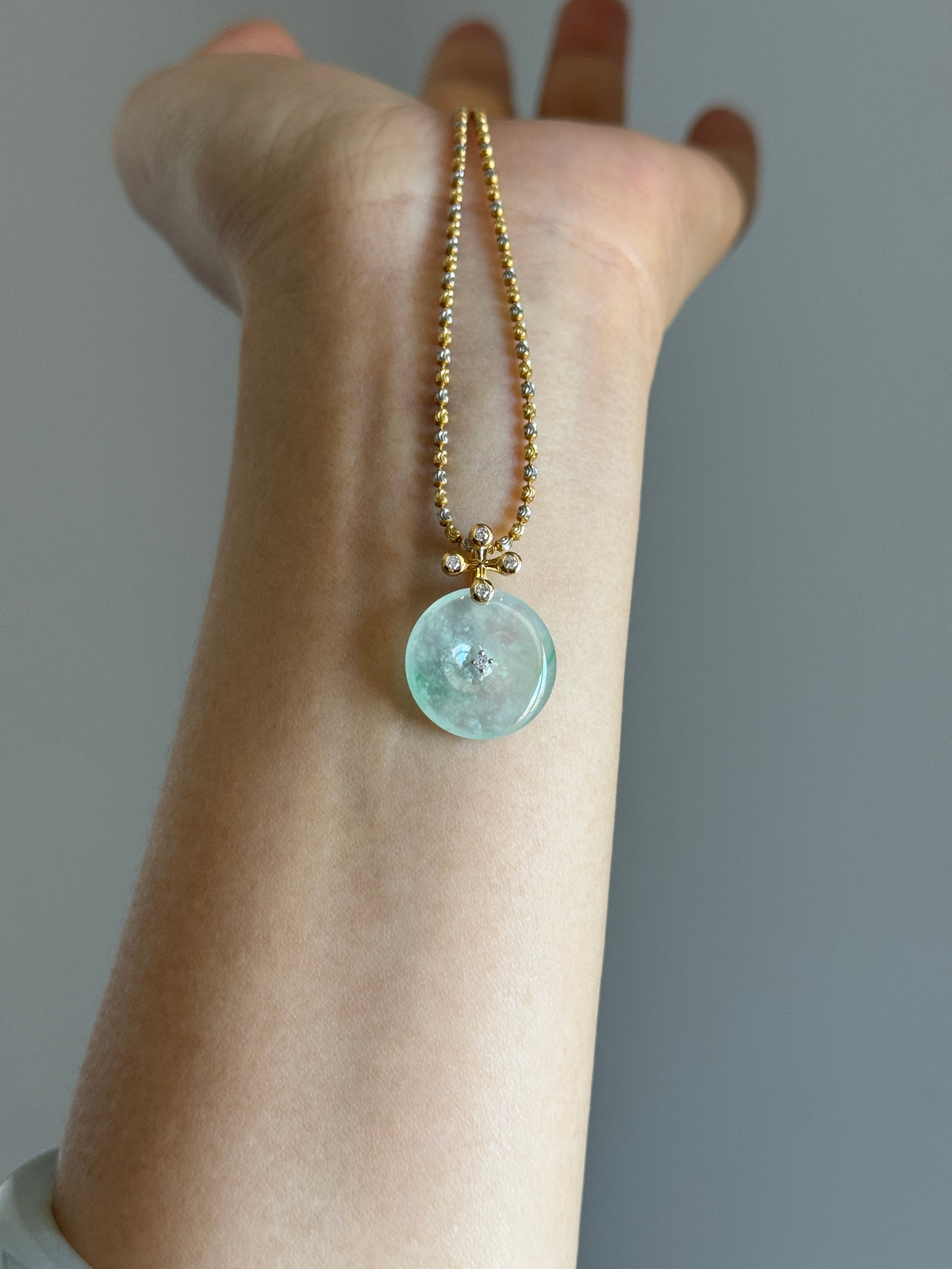 #P0571 "Blossom Bi" Highly Icy White Sun Green Jadeite Jade Donut 18K Yellow Gold Pendant