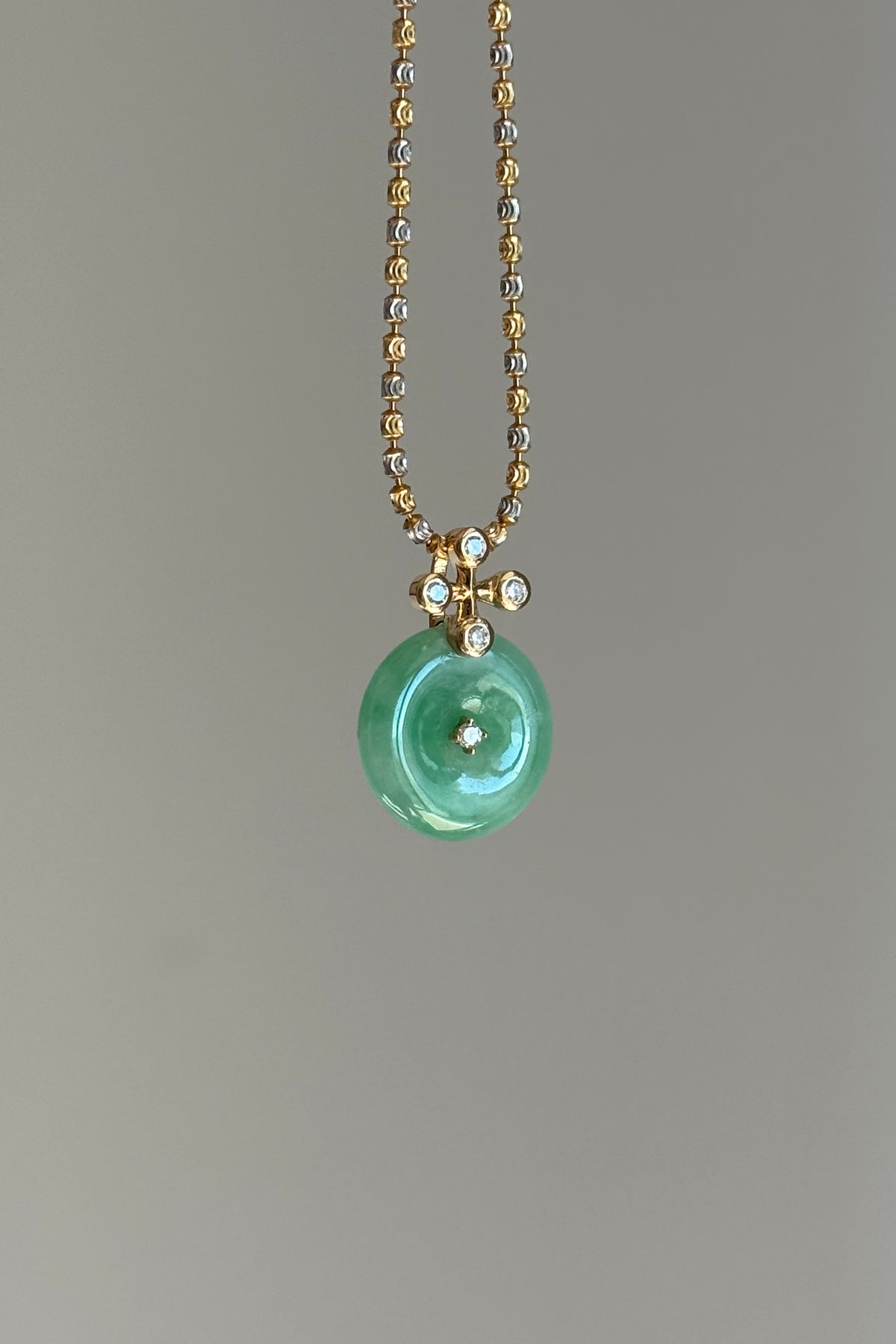 #P0570 "Blossom Bi" Icy Sun Green Jadeite Jade Donut 18K Yellow Gold Pendant