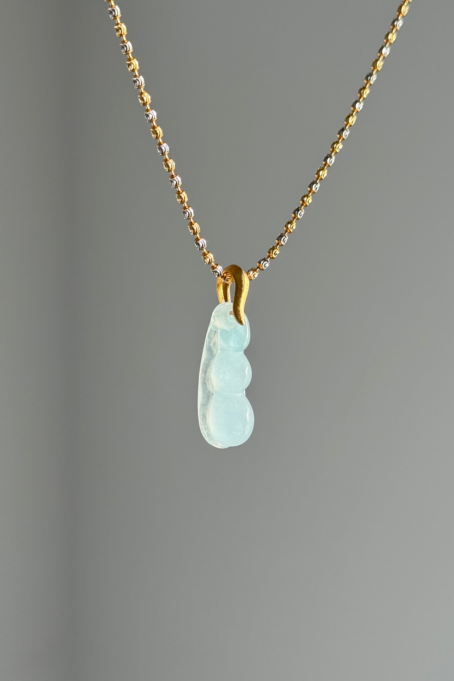#P0506 "Fortune Bean" Highly Icy White Light Blue Jadeite Jade 18K Yellow Gold Pendant